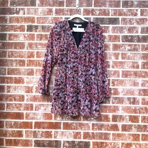 BCBGeneration floral print long sleeve romper.